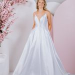 mikado gown with flattering waistline and v neck with straps and low back