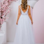 A-line gown with Sweet lace blossoms and trailing vines covering the bodice