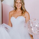 strapless sweetheart neckline ballgown with All frills and ruffles and a full tulle skirt