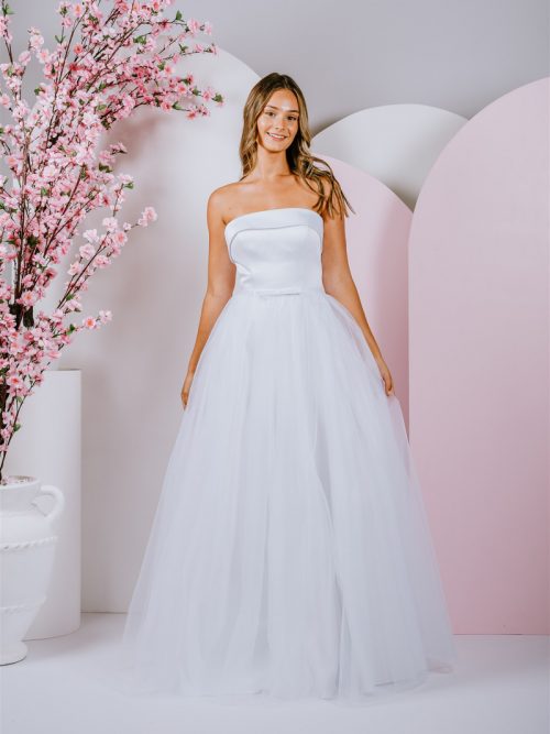 Featured strapless neckline gown with cute bow at waist