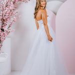 Featured strapless neckline gown with cute bow at waist