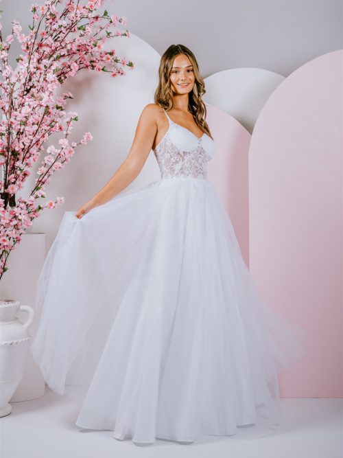 Delicate floral lace creates a translucent bodice, with tulle skirt ballgown
