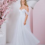 soft draped sleeves with elegant, pleated tulle bodice with exposed boning ballgown