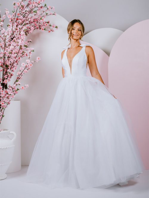 silhouette gown with sweet bows on the shoulder and deep v neckline with tulle skirt