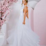 silhouette gown with sweet bows on the shoulder and deep v neckline with tulle skirt