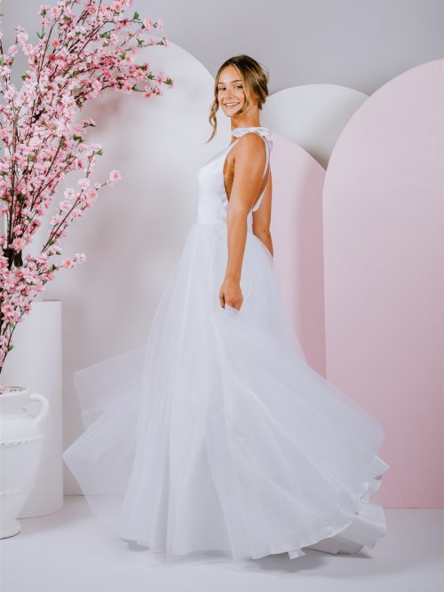 silhouette gown with sweet bows on the shoulder and deep v neckline with tulle skirt
