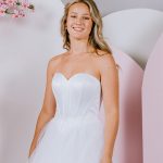 Sweetheart neckline with exposed boning as the feature and tulle ballgown