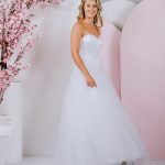 Sweetheart neckline with exposed boning as the feature and tulle ballgown