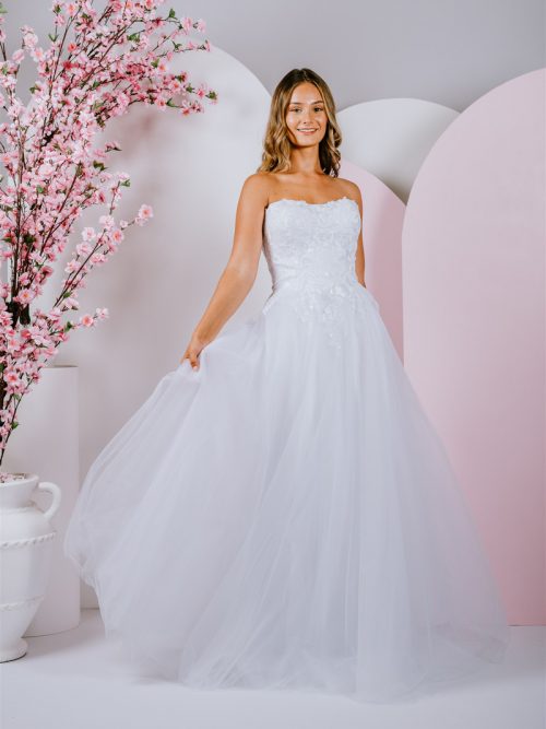 Gown with a sequined strapless style with a straight neckline and sheer back with a lace-up finish
