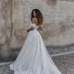 E313 ‘NASRIN’ ABELLA off-shoulder sleeves and trailing lacy vines across the bodice and hem