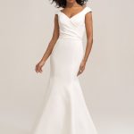 3460 Allure Romance Ruched along the bodice, this fit and flare satin gown